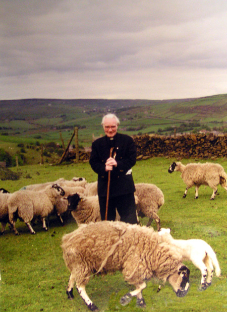 Fr-Joe-with-sheep.jpg